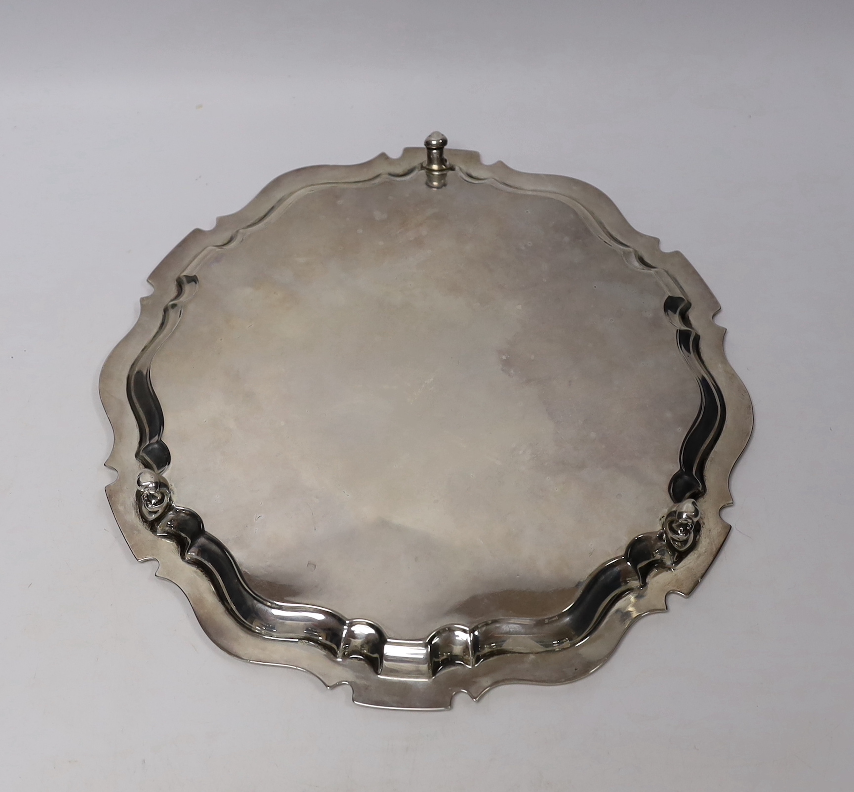 An Edwardian engraved silver salver, JT & Co?, Sheffield, 1905, on three scroll feet, 29.5cm